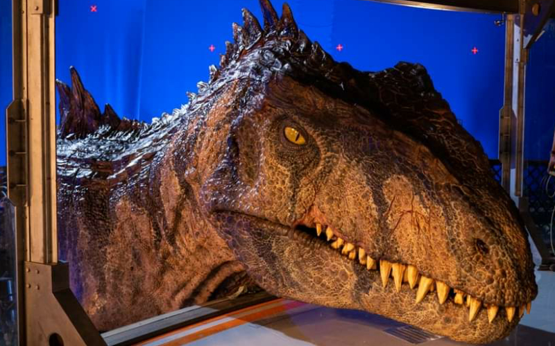 Jurassic World Dominion: Behind the scenes photos of life size Giganotosaurus animatronic prop!