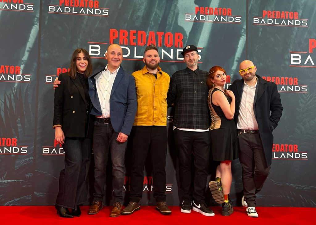 A photo of the Siren Craft Brew team at the Predator: Badlands premiere
